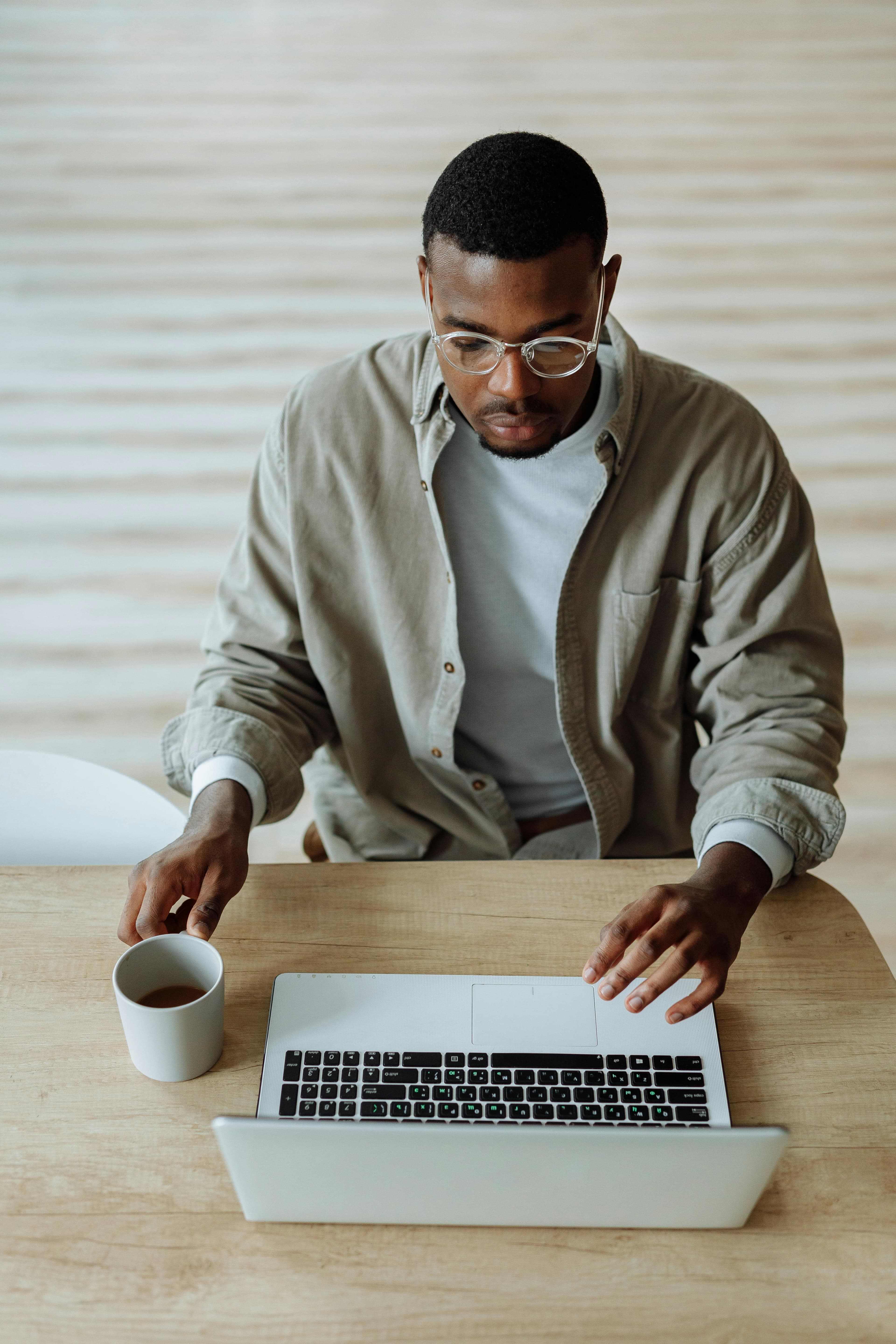 Employer reviewing shortlist on laptop